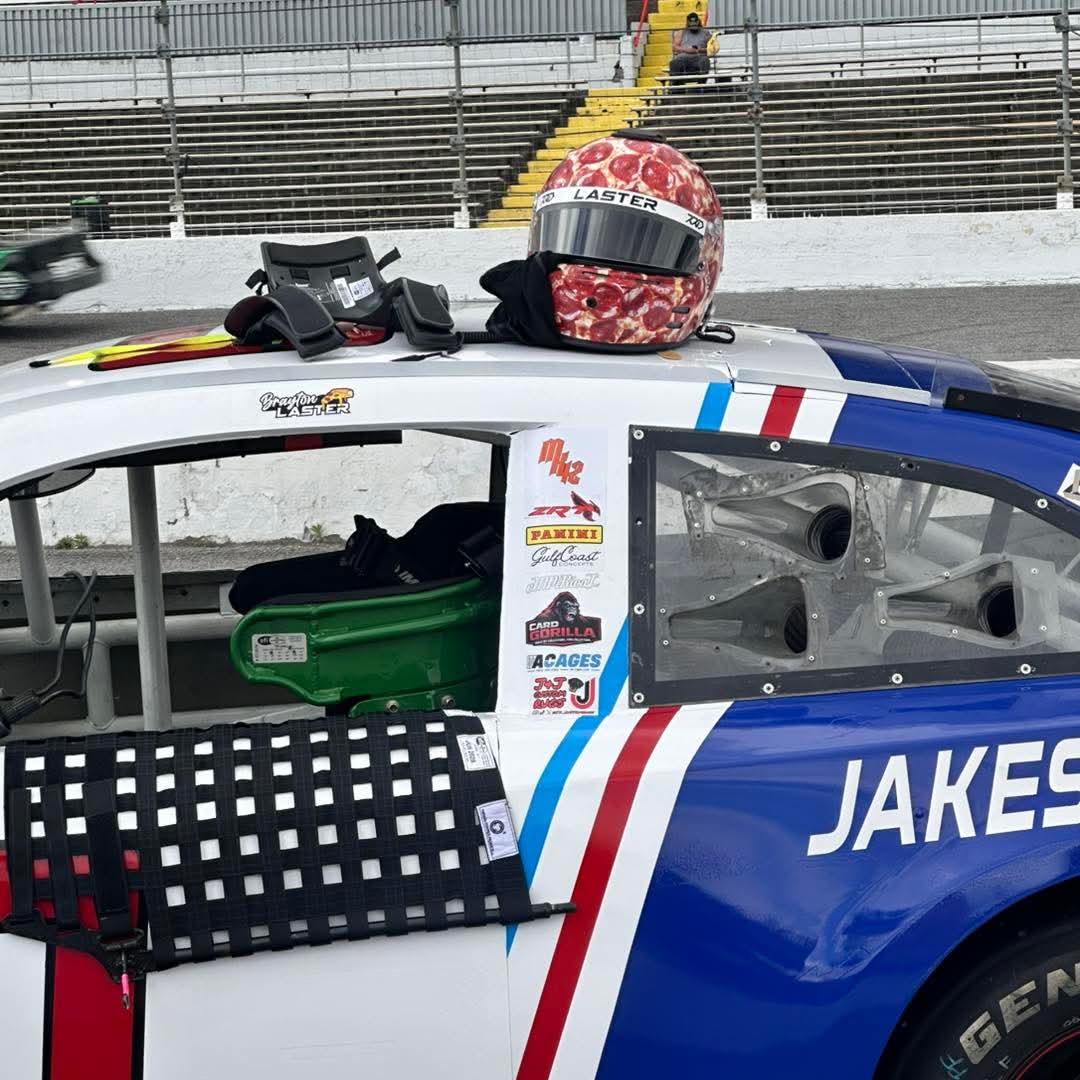 Gulf Coast Concepts sponsor sticker on Brayton Laster's car with his pizza-themed helmet resting on the roof