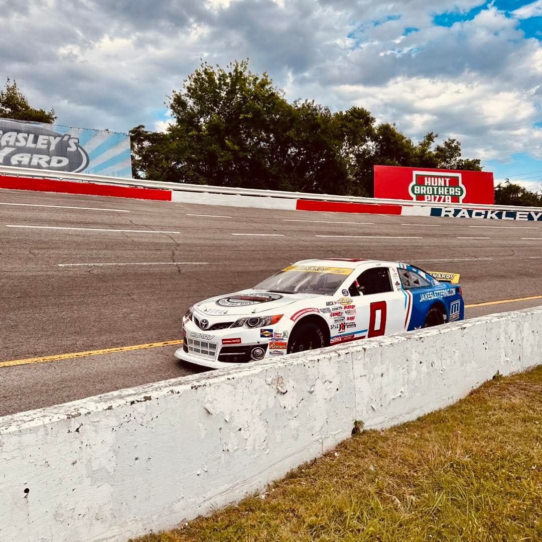 Brayton Laster's #0 Toyota Camry running at speed on track